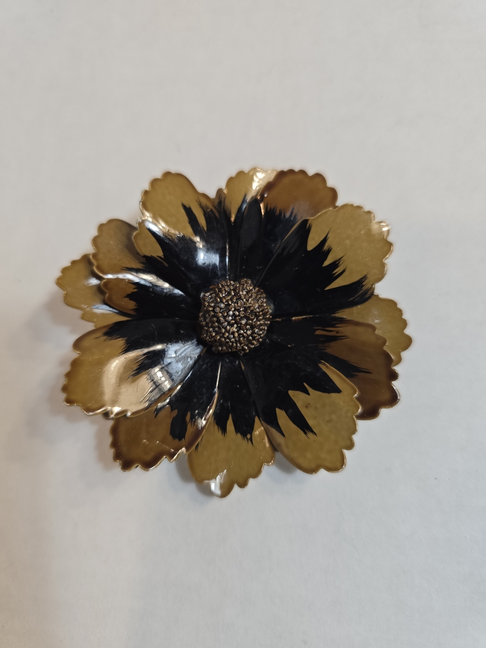 Source Unknown Gold and Black Floral Enamel Brooch